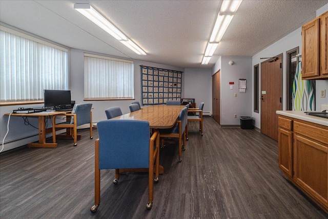 2601 Kenzie Ter Unit 519, Saint Anthony, MN 55418 - dining area with dark wood finished floors and a textured ceiling