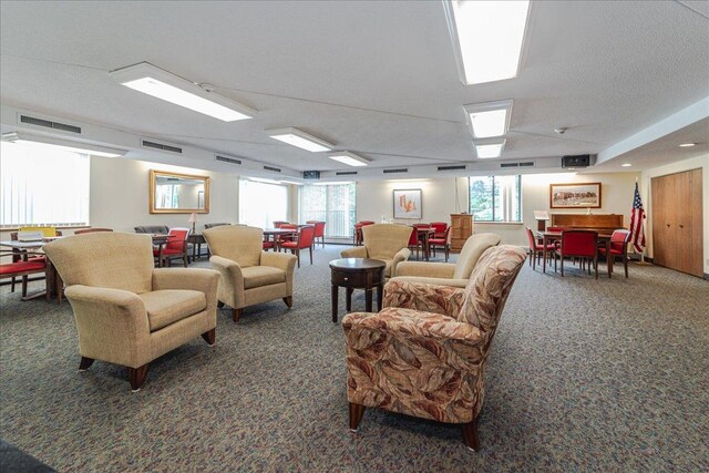 2601 Kenzie Ter Unit 519, Saint Anthony, MN 55418 - carpeted living area featuring healthy amount of natural light