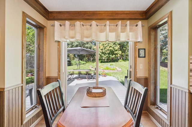 901 Grandview Dr, Hudson, WI 54016 - dining area with wainscoting, wooden walls, and crown molding