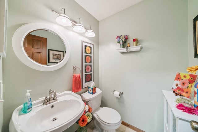 901 Grandview Dr, Hudson, WI 54016 - half bath featuring a sink and tile patterned floors