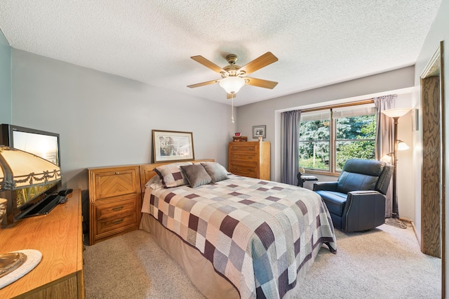 901 Grandview Dr, Hudson, WI 54016 - bedroom with light colored carpet, a textured ceiling, and ceiling fan
