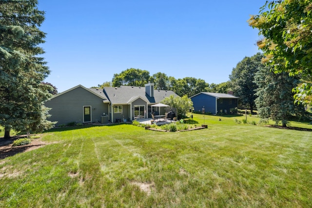 901 Grandview Dr, Hudson, WI 54016 - view of green lawn with a patio