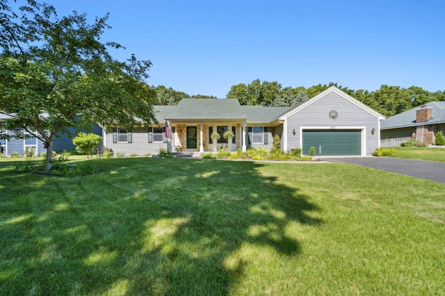 901 Grandview Dr, Hudson, WI 54016 - ranch-style home featuring an attached garage, asphalt driveway, and a front lawn