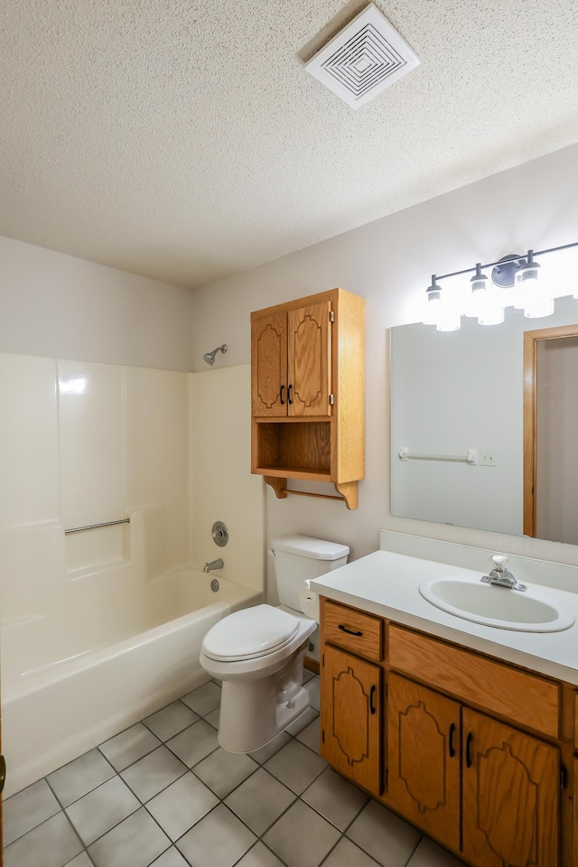 13752 Round Lake Blvd NW, Andover, MN 55304 - full bath featuring vanity, a textured ceiling, shower / bathtub combination, and tile patterned flooring
