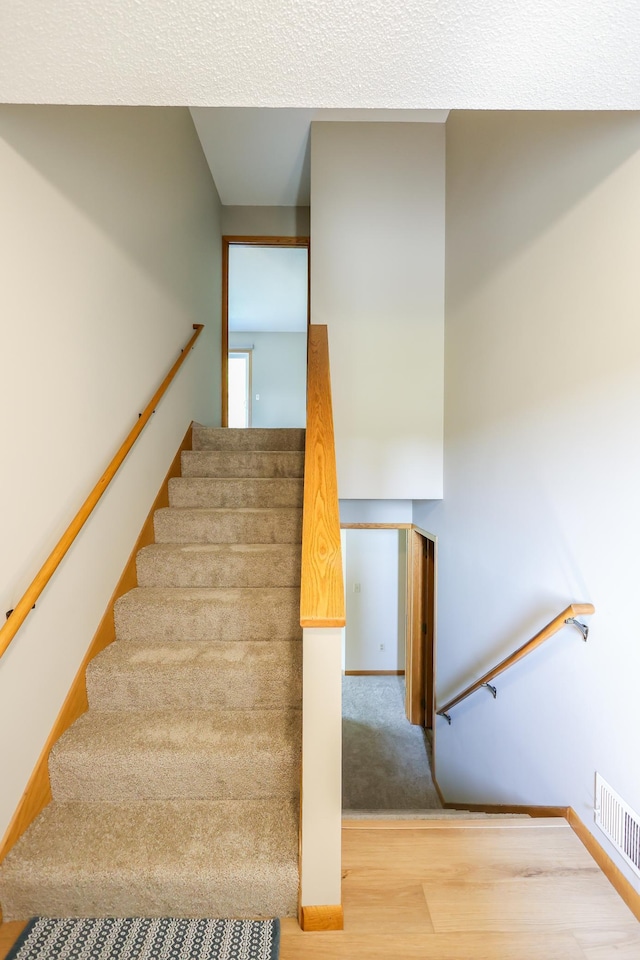 13752 Round Lake Blvd NW, Andover, MN 55304 - stairs with wood finished floors