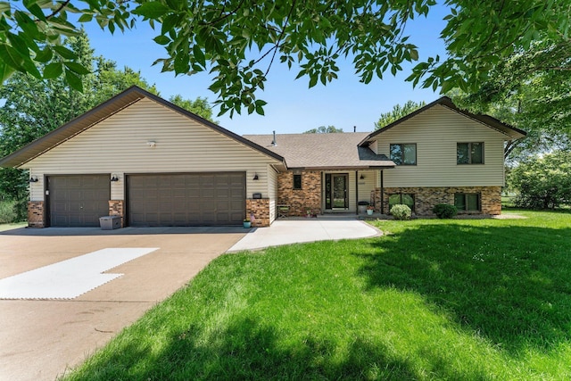 10200 Kadler Ave NE, Otsego, MN 55362 - tri-level home featuring concrete driveway, a front yard, a garage, brick siding, and roof with shingles