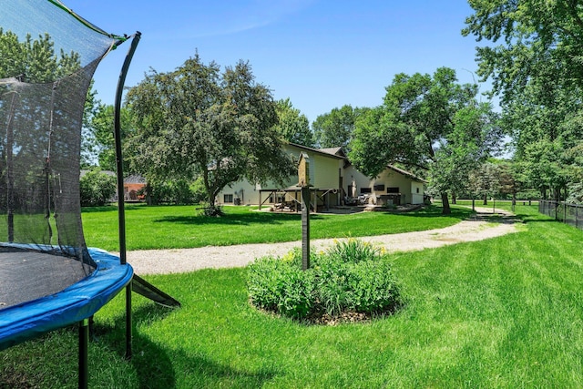 10200 Kadler Ave NE, Otsego, MN 55362 - view of yard featuring a trampoline