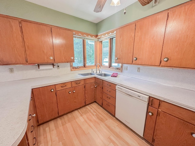 540 8th St, Bird Island, MN 55310 - kitchen featuring dishwasher, light wood-style floors, and light countertops