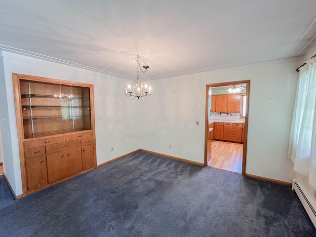 540 8th St, Bird Island, MN 55310 - carpeted spare room with a baseboard radiator, a chandelier, and ornamental molding