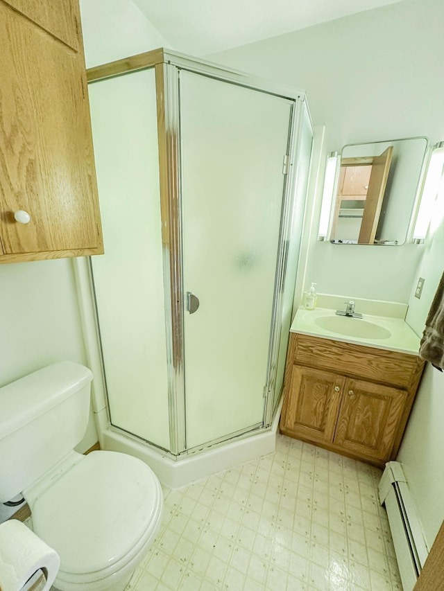 540 8th St, Bird Island, MN 55310 - bathroom with baseboard heating, tile patterned floors, vanity, and a shower stall