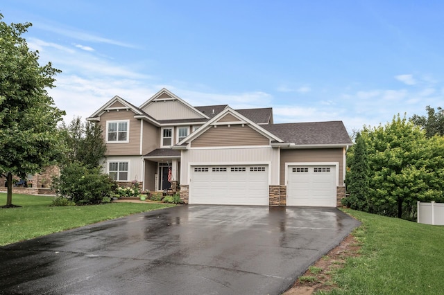 1799 158th Ln NW, Andover, MN 55304 - craftsman inspired home featuring stone siding, driveway, an attached garage, a front yard, and a shingled roof