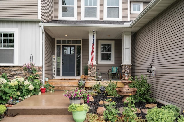 1799 158th Ln NW, Andover, MN 55304 - doorway to property featuring a porch and stone siding