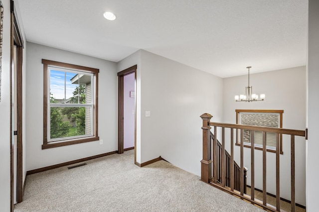 1799 158th Ln NW, Andover, MN 55304 - carpeted empty room with a chandelier and recessed lighting