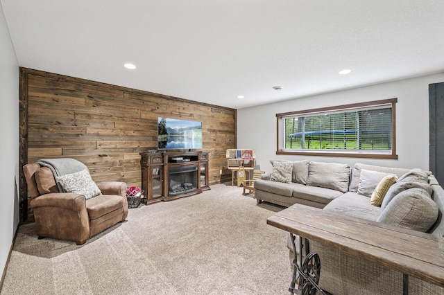 1799 158th Ln NW, Andover, MN 55304 - carpeted living area featuring wood walls, recessed lighting, and a glass covered fireplace