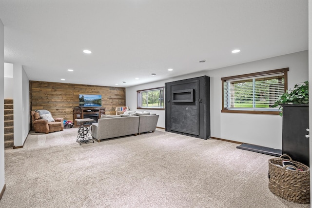 1799 158th Ln NW, Andover, MN 55304 - carpeted living area with wooden walls, healthy amount of natural light, recessed lighting, stairway, and a fireplace