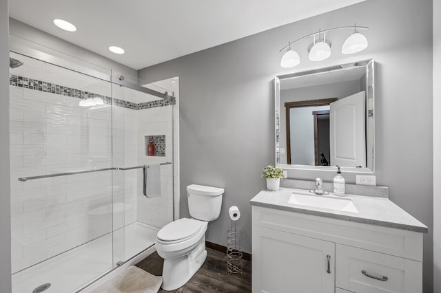 1799 158th Ln NW, Andover, MN 55304 - bathroom featuring a shower stall, wood finished floors, and vanity