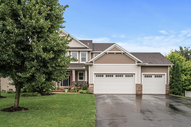 1799 158th Ln NW, Andover, MN 55304 - craftsman house featuring asphalt driveway, an attached garage, a front yard, and roof with shingles