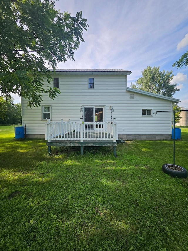 15596 464th St, Hewitt, MN 56453 - back of house with a deck and a yard