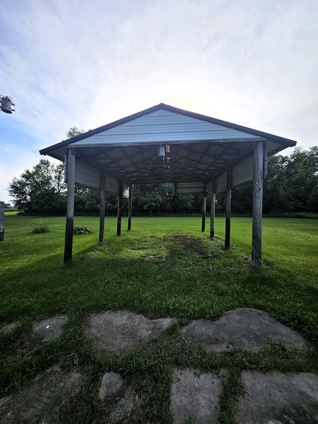 15596 464th St, Hewitt, MN 56453 - view of home's community featuring a detached carport and a yard
