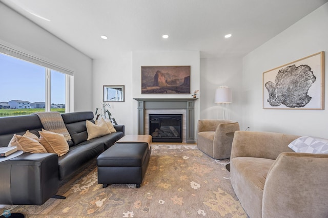 10128 Concord Dr, Horace, ND 58047 - living area with a glass covered fireplace and recessed lighting
