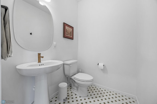 10128 Concord Dr, Horace, ND 58047 - half bath with baseboards and toilet