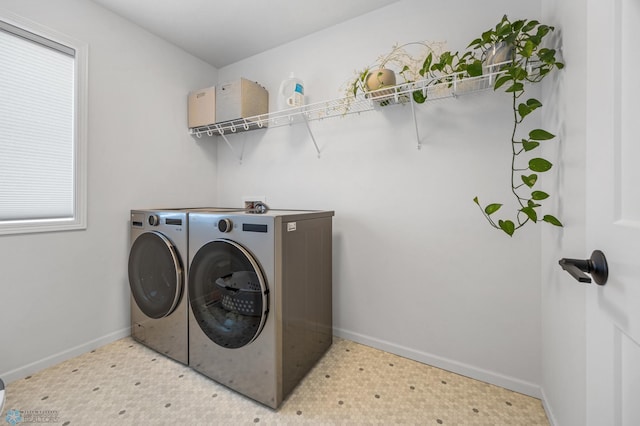10128 Concord Dr, Horace, ND 58047 - laundry room with separate washer and dryer and baseboards