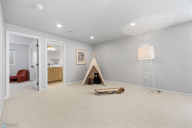 10128 Concord Dr, Horace, ND 58047 - recreation room with light carpet and recessed lighting