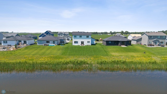 10128 Concord Dr, Horace, ND 58047 - back of property featuring a residential view, a water view, and a yard