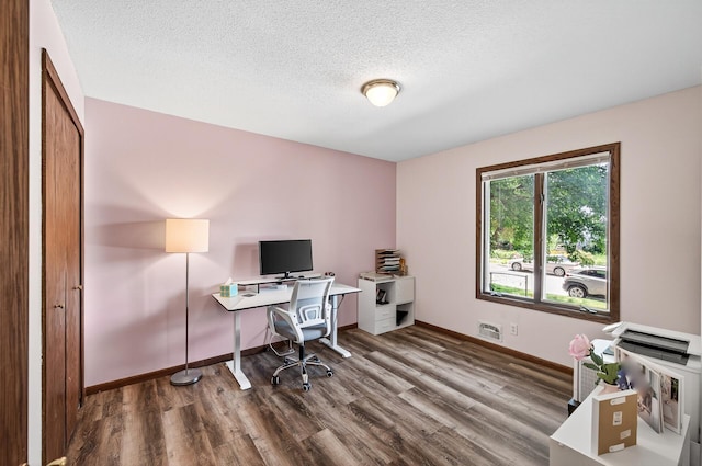 3850 Bryant Ave N, Minneapolis, MN 55412 - office space featuring wood finished floors and a textured ceiling