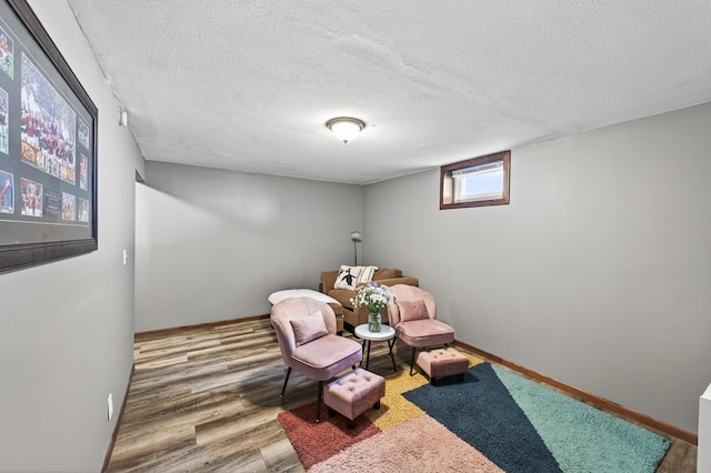 3850 Bryant Ave N, Minneapolis, MN 55412 - living area with a textured ceiling and wood finished floors