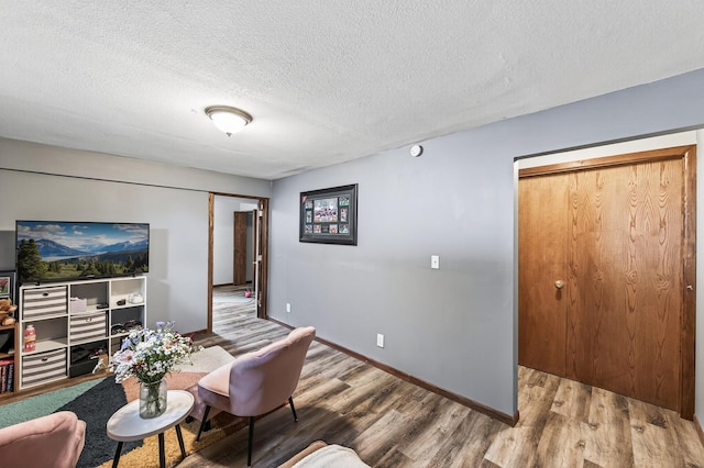 3850 Bryant Ave N, Minneapolis, MN 55412 - living room with wood finished floors and a textured ceiling