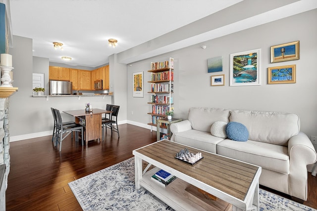 545 1st St Unit 400, Minneapolis, MN 55401 - living room featuring baseboards and dark wood finished floors