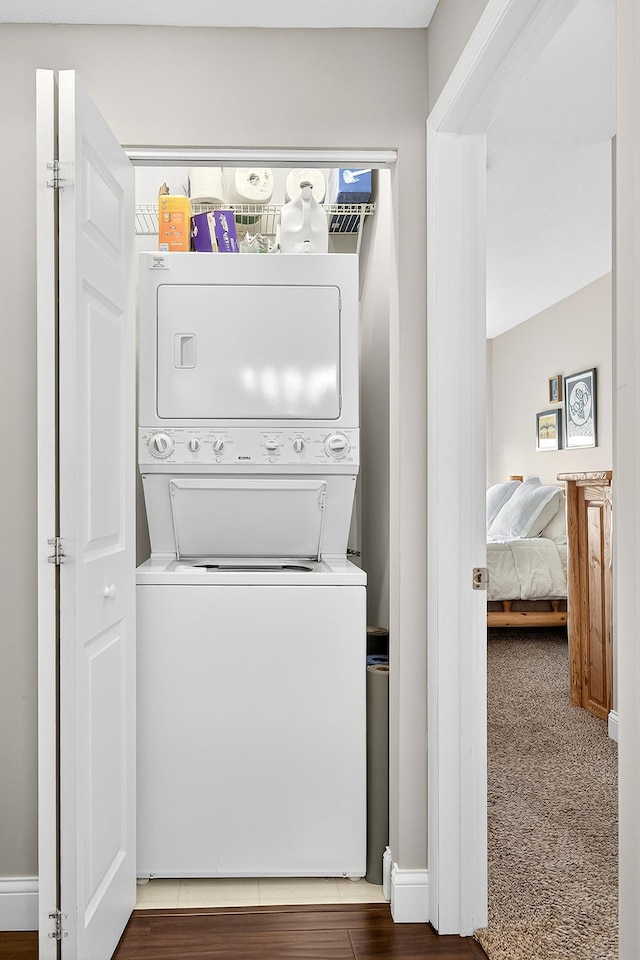 545 1st St Unit 400, Minneapolis, MN 55401 - washroom featuring stacked washer / dryer