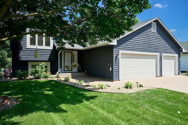 19161 Zane St NW, Elk River, MN 55330 - tri-level home featuring driveway, a garage, and a front lawn
