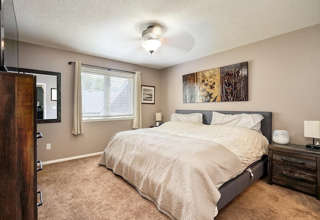 19161 Zane St NW, Elk River, MN 55330 - bedroom featuring carpet flooring, a textured ceiling, and a ceiling fan