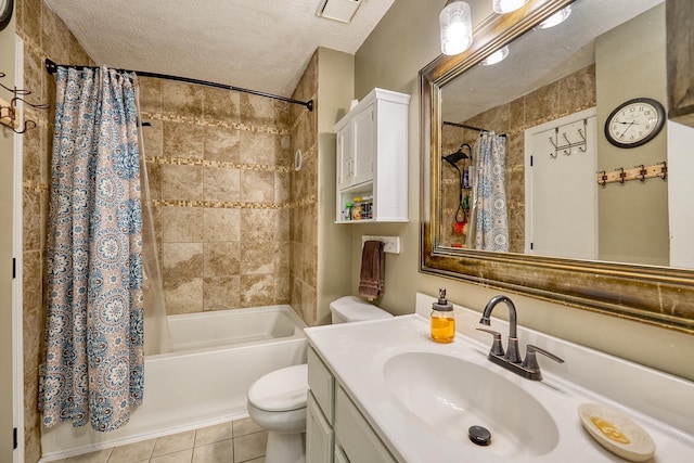 19161 Zane St NW, Elk River, MN 55330 - full bath with shower / tub combo, vanity, a textured ceiling, and tile patterned flooring