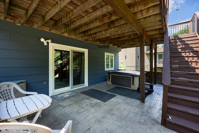 19161 Zane St NW, Elk River, MN 55330 - view of patio / terrace with a hot tub and stairway