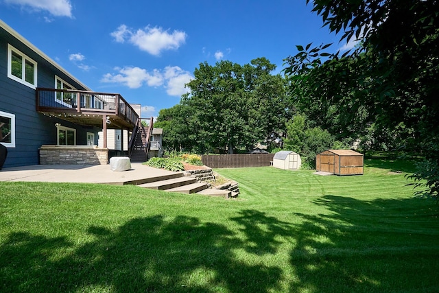 19161 Zane St NW, Elk River, MN 55330 - view of yard with a storage shed, stairs, a patio, and a deck
