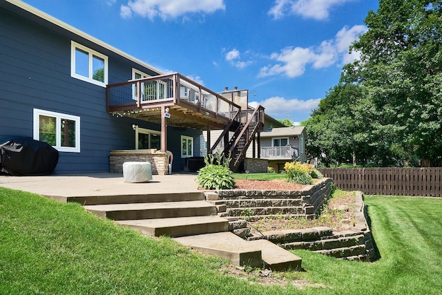 19161 Zane St NW, Elk River, MN 55330 - back of property featuring a wooden deck, stairway, and a patio area