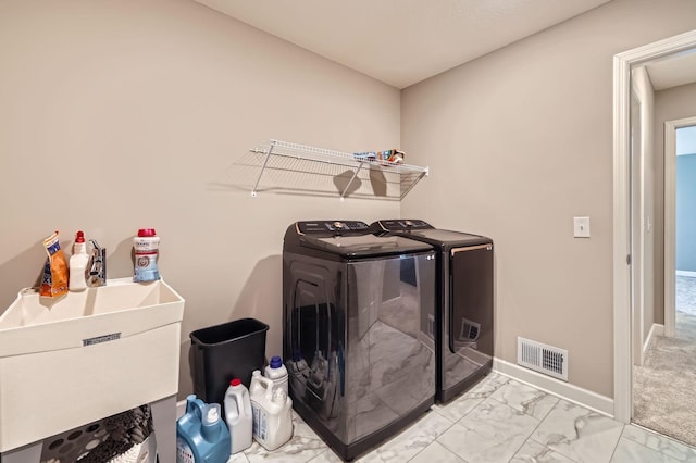 11887 73rd St NE, Otsego, MN 55301 - washroom featuring washing machine and dryer and light marble finish flooring