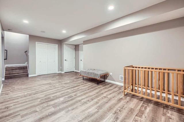 11887 73rd St NE, Otsego, MN 55301 - bedroom with wood finished floors, a closet, and recessed lighting
