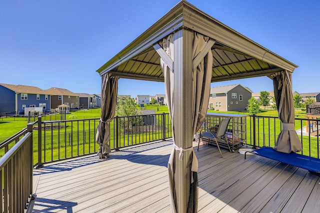 11887 73rd St NE, Otsego, MN 55301 - wooden terrace featuring a gazebo, a residential view, and a lawn
