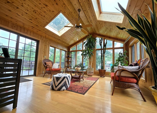 2108 74th Ave N, Brooklyn Park, MN 55444 - living area featuring a skylight, high vaulted ceiling, ceiling fan, wood ceiling, and wood finished floors