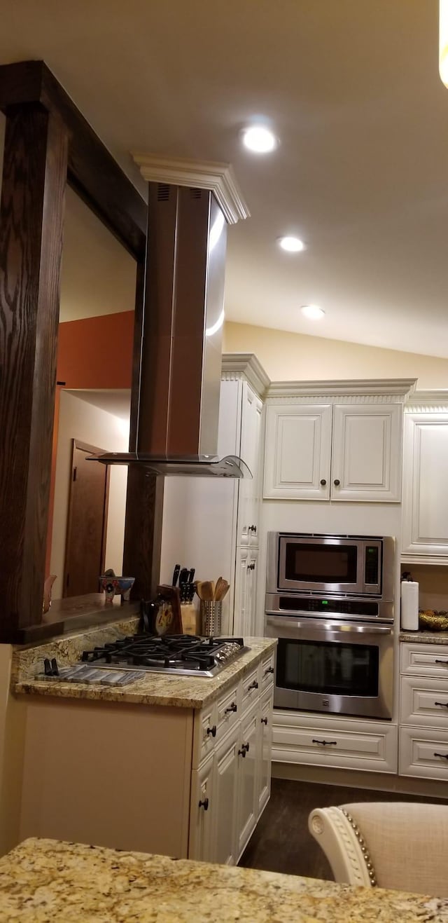2108 74th Ave N, Brooklyn Park, MN 55444 - kitchen featuring stainless steel appliances, ventilation hood, light stone countertops, white cabinetry, and recessed lighting