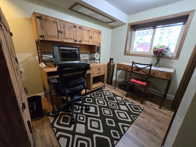 2108 74th Ave N, Brooklyn Park, MN 55444 - office space featuring light wood-type flooring and a textured ceiling