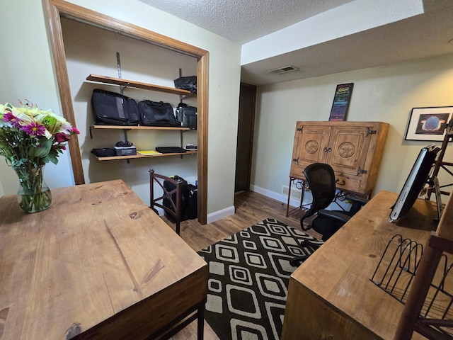 2108 74th Ave N, Brooklyn Park, MN 55444 - office space with wood finished floors and a textured ceiling