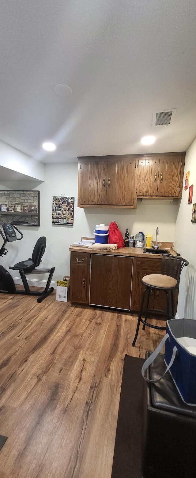 2108 74th Ave N, Brooklyn Park, MN 55444 - kitchen with light wood-style flooring and a sink
