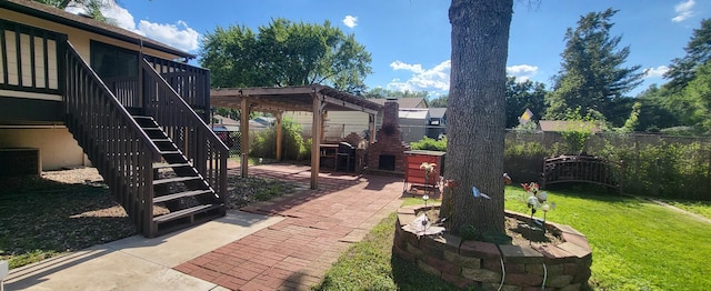 2108 74th Ave N, Brooklyn Park, MN 55444 - fenced backyard with a patio, stairway, and a wooden deck