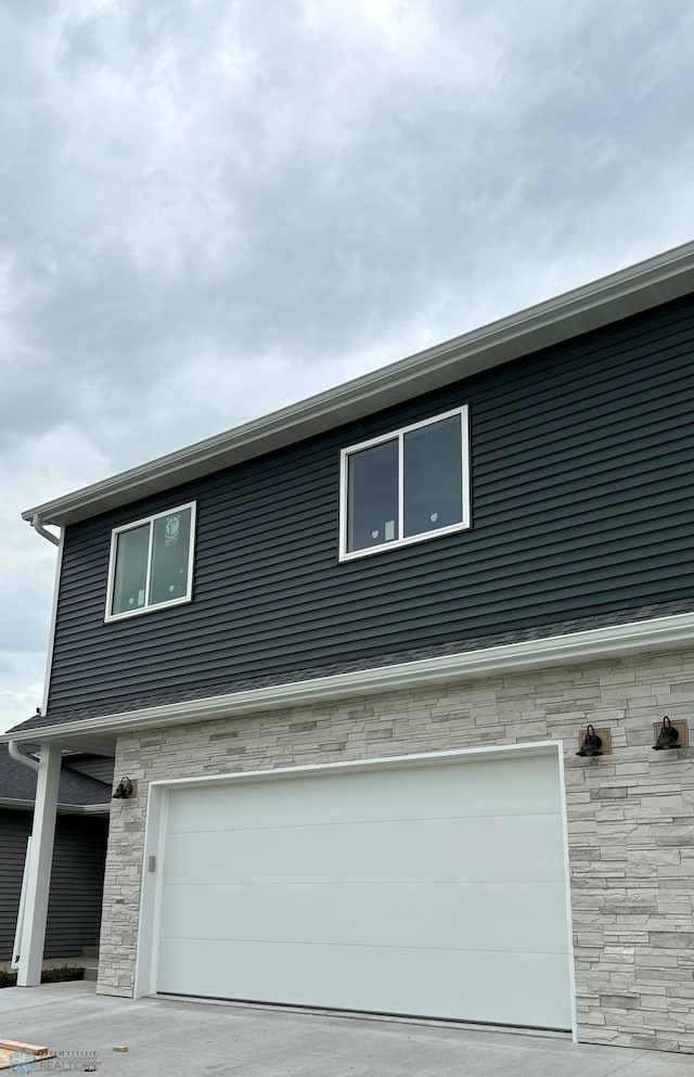 131 Pine Ave, Mapleton, ND 58059 - view of front of home with a garage