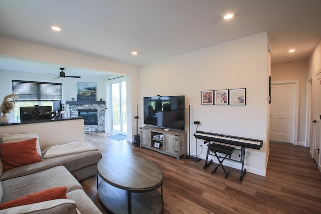 1267 Naser Way, New Richmond, WI 54017 - living area featuring wood finished floors, plenty of natural light, a fireplace, a ceiling fan, and recessed lighting